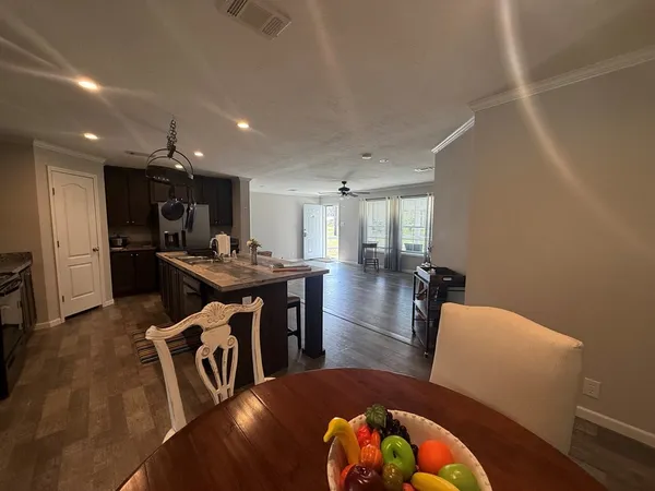 a view of a dining room with furniture