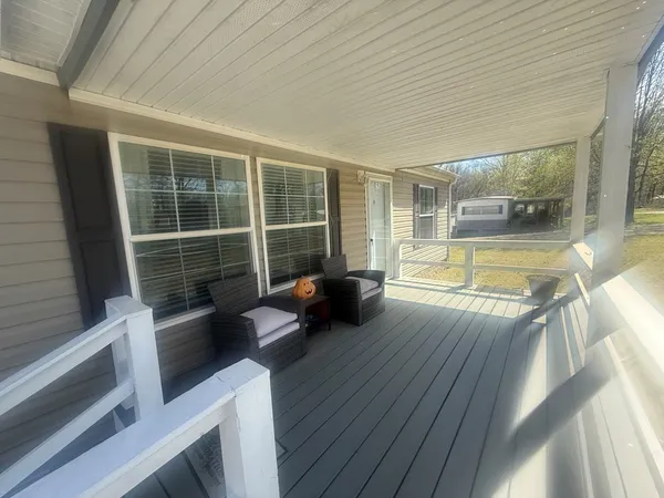 a view of a living room and hardwood floor