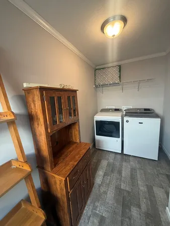 a kitchen with stainless steel appliances granite countertop a stove and a sink