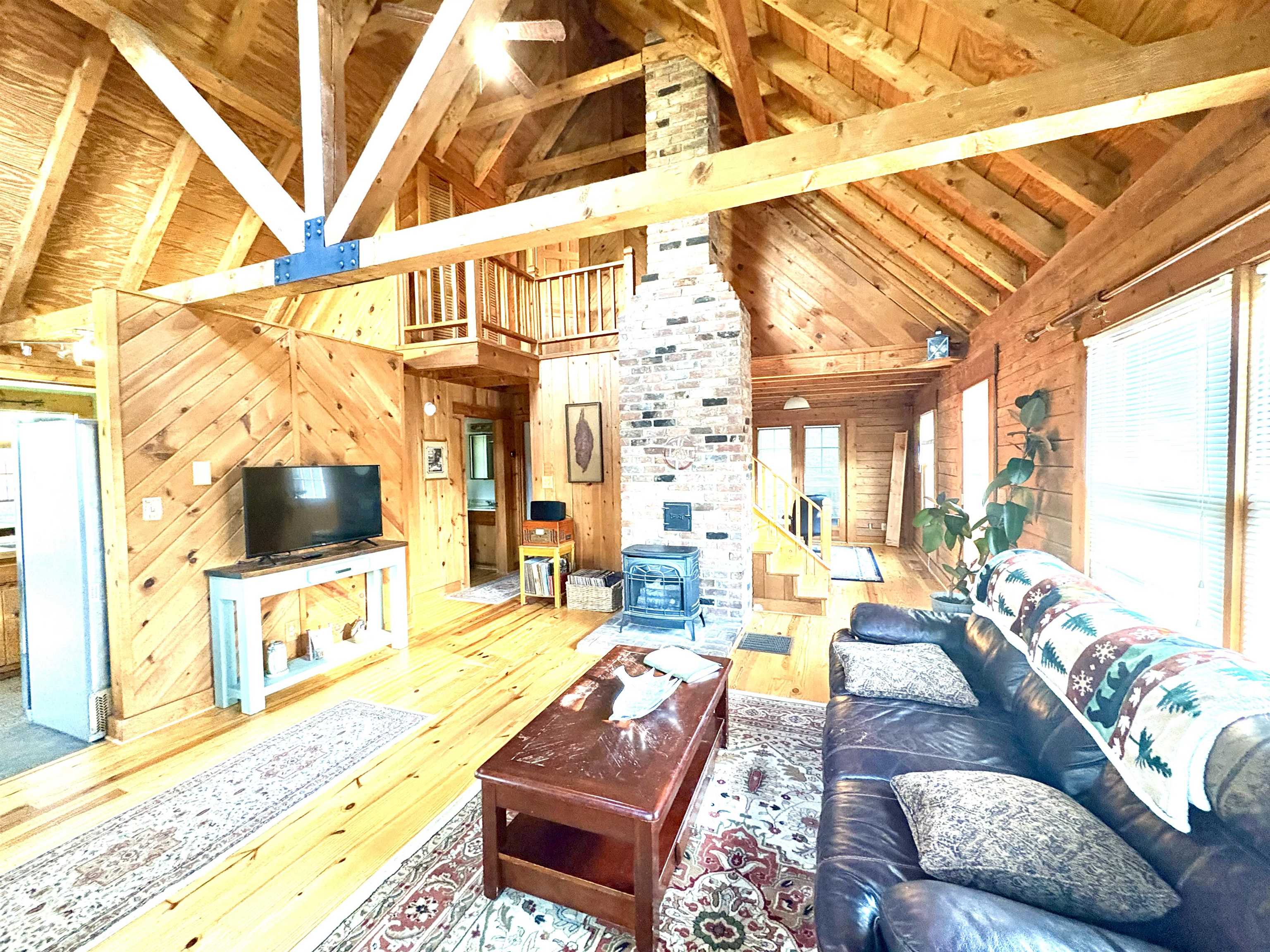 79 River Rdg Road Verona, VA 24482 - Photo 21 of 34 a living room with patio furniture and a flat screen tv