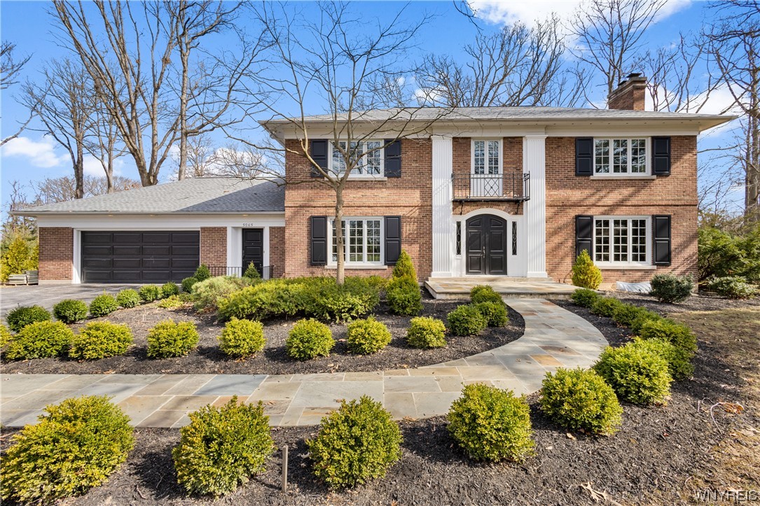 Stately brick colonial in Lewiston Heights