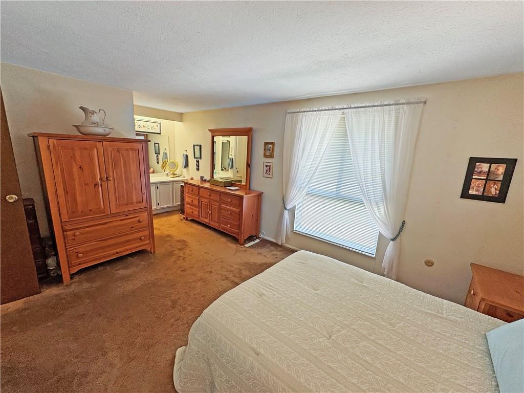 2303 Firethorn Road Bridgeville, PA 15017 - Photo 13 of 25 The master bedroom features a double closet and full bath.
