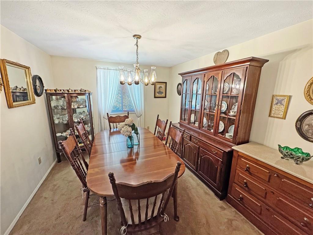 2303 Firethorn Road Bridgeville, PA 15017 - Photo 6 of 25 The dining room.