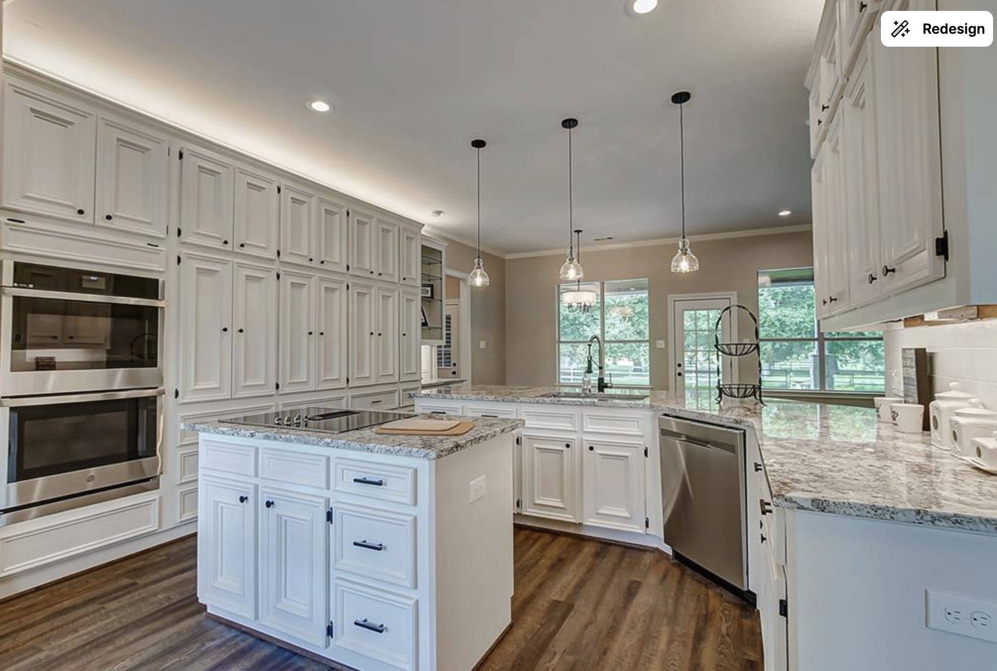 4309 Bowser Road Fulshear, TX 77441 - Photo 12 of 21 a kitchen with stainless steel appliances granite countertop a stove a sink and white cabinets with wooden floor