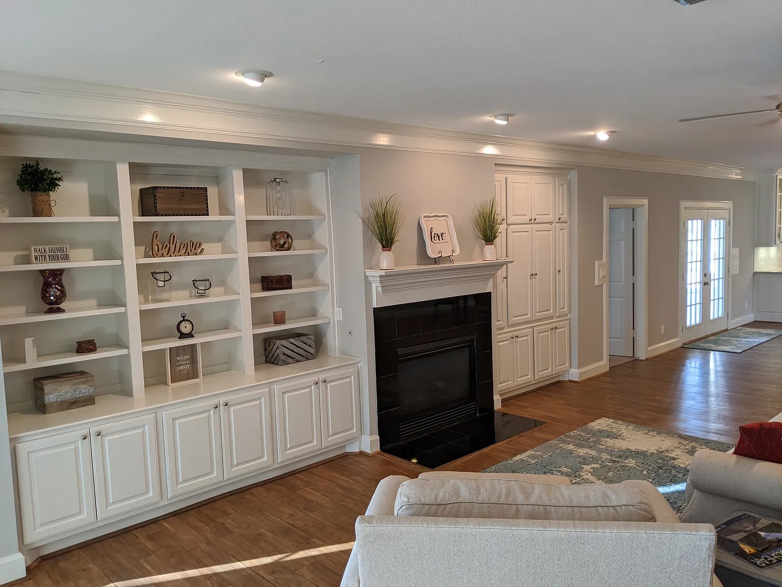 4309 Bowser Road Fulshear, TX 77441 - Photo 15 of 21 a living room with furniture and a fireplace