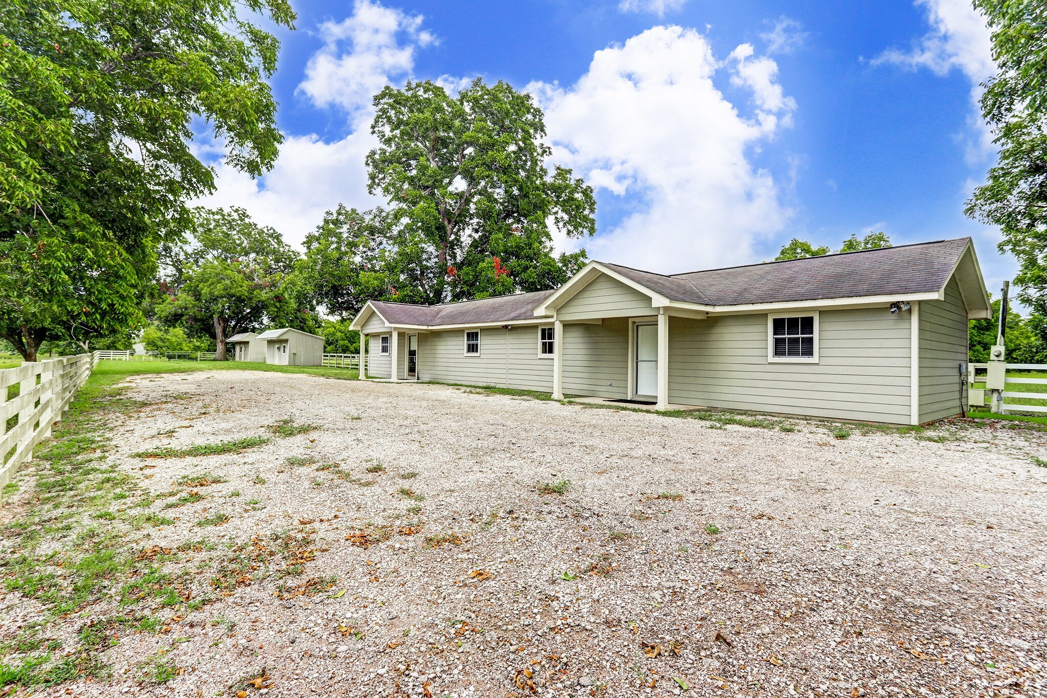 4309 Bowser Road Fulshear, TX 77441 - Photo 3 of 21 front view of a house with a yard