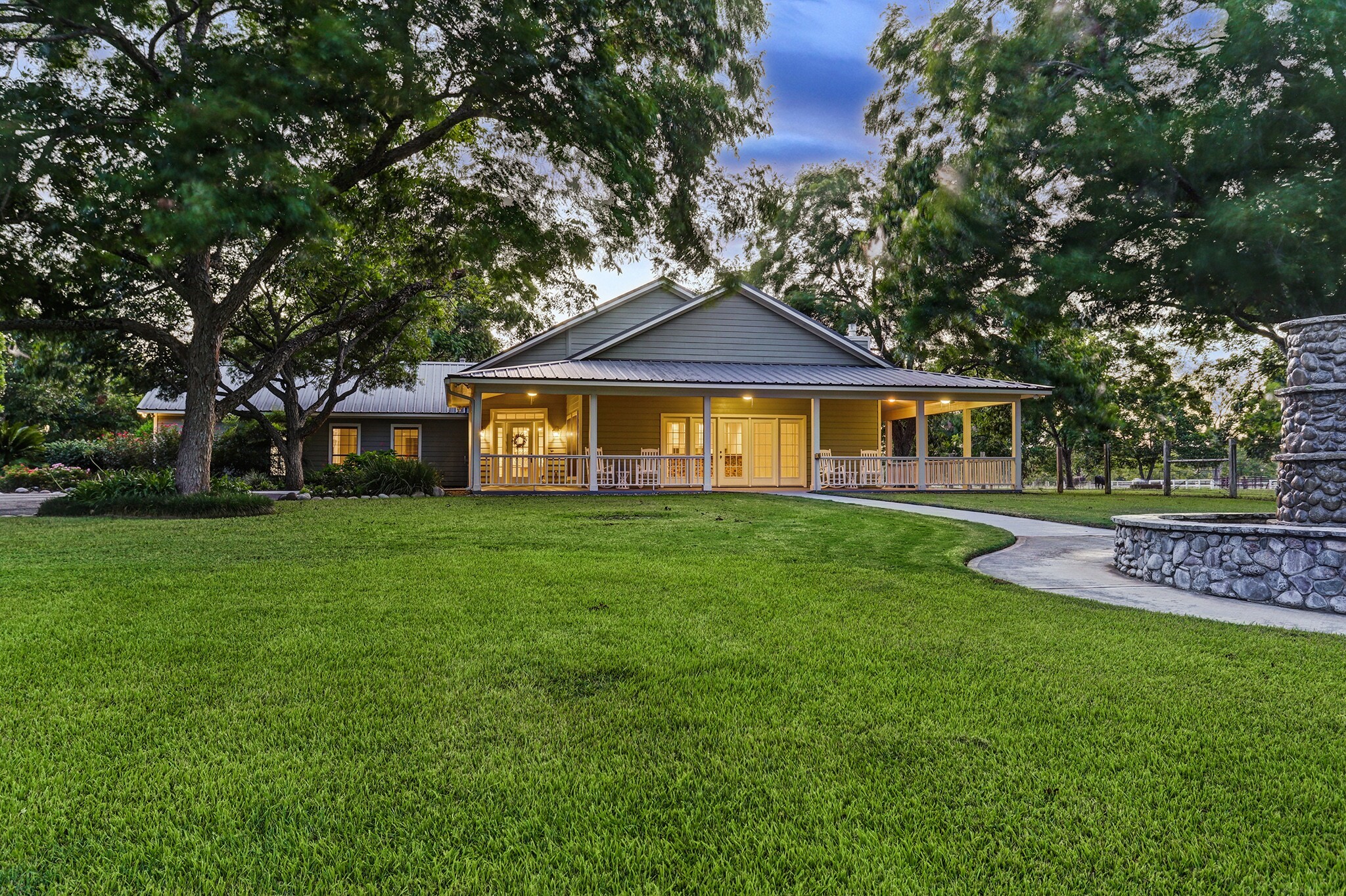 4309 Bowser Road Fulshear, TX 77441 - Photo 6 of 21 a front view of a house with garden