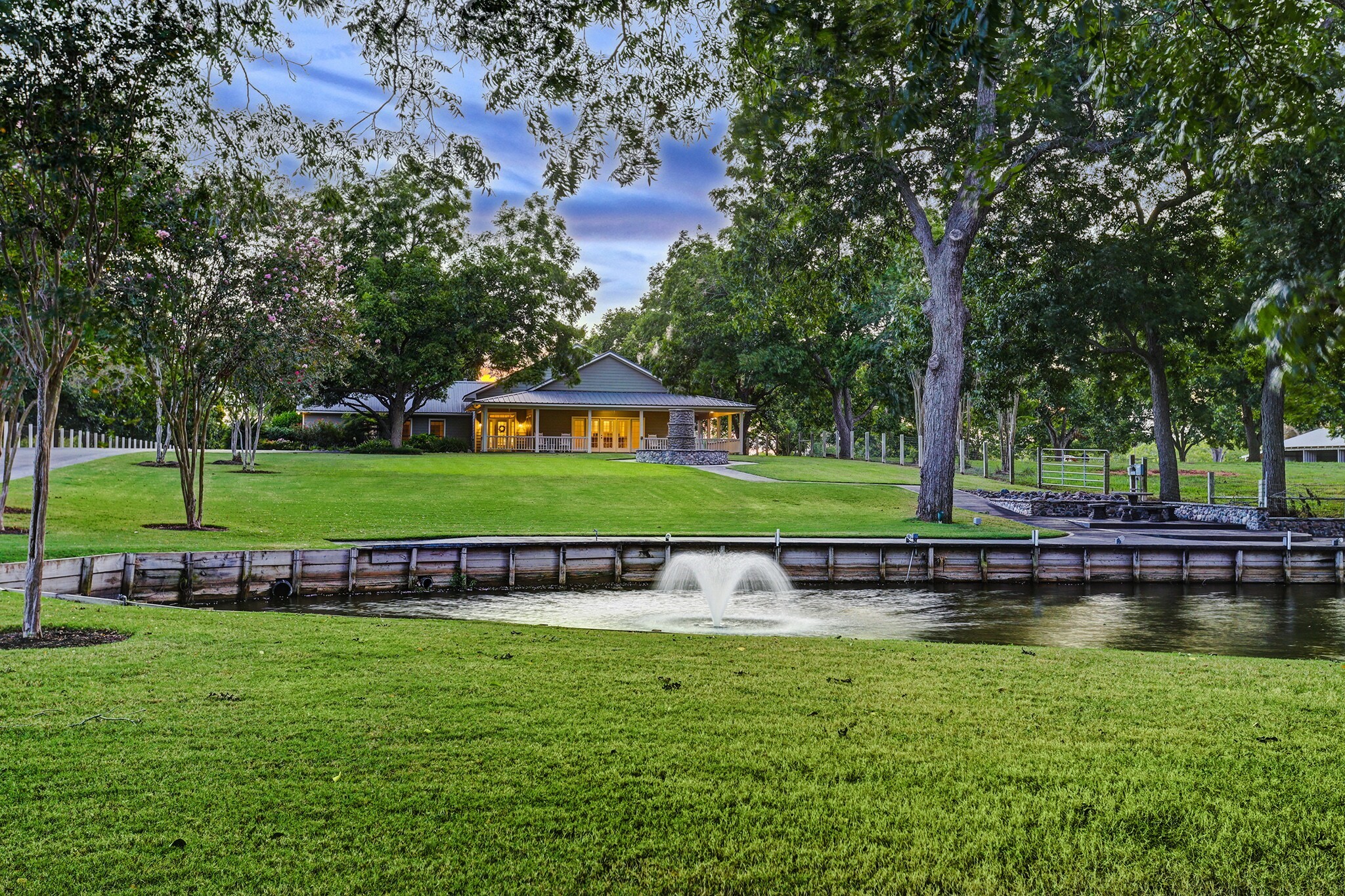 4309 Bowser Road Fulshear, TX 77441 - Photo 7 of 21 a front view of a house with a garden and swimming pool