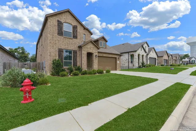 a front view of house with yard