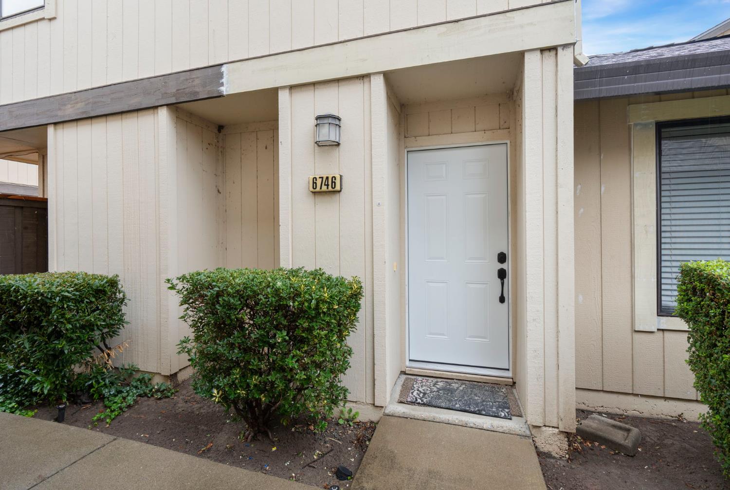 a view of a back yard of the house