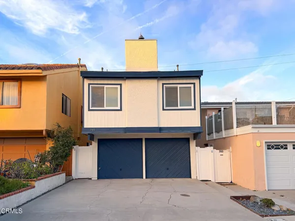 a house that has a lot of windows on it