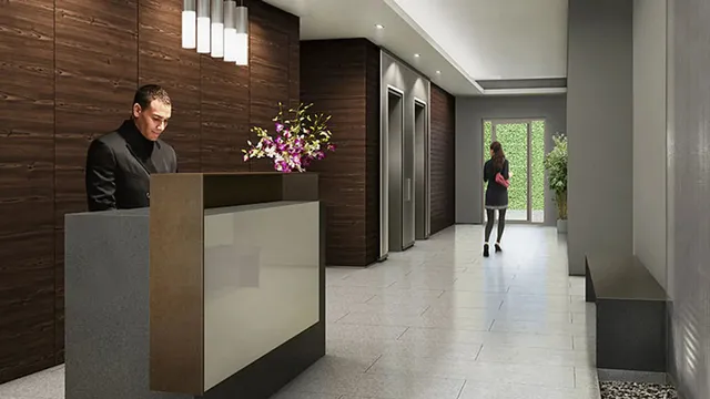 a hallway with a flower pot and a fireplace