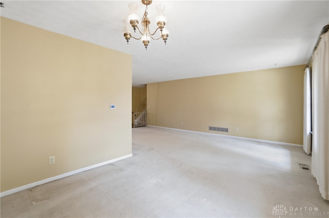 9964 Hummingbird Way Dayton, OH 45458 - Photo 13 of 57 This expansive room offers a blank canvas for your design aspirations, bathed in natural light.