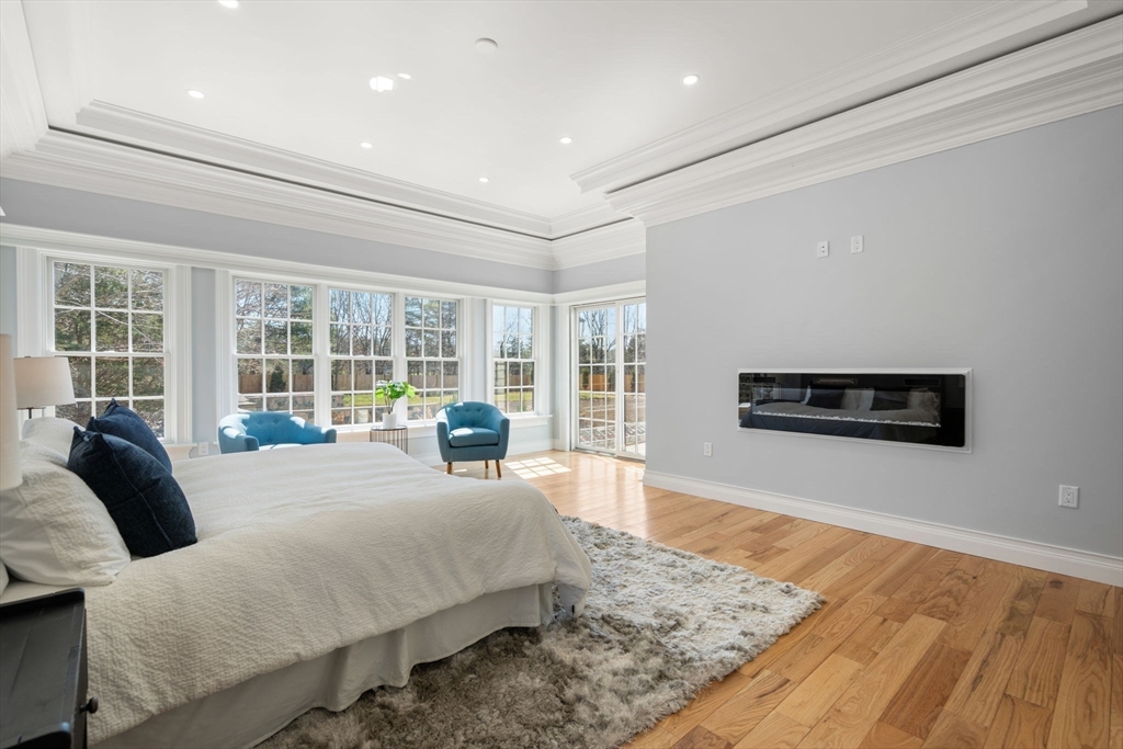10 Hitching Post Lane Weston, MA 02493 - Photo 20 of 42 a living room with furniture and a large window