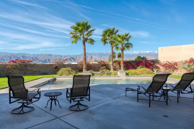 a view of a chairs and table on the terrace