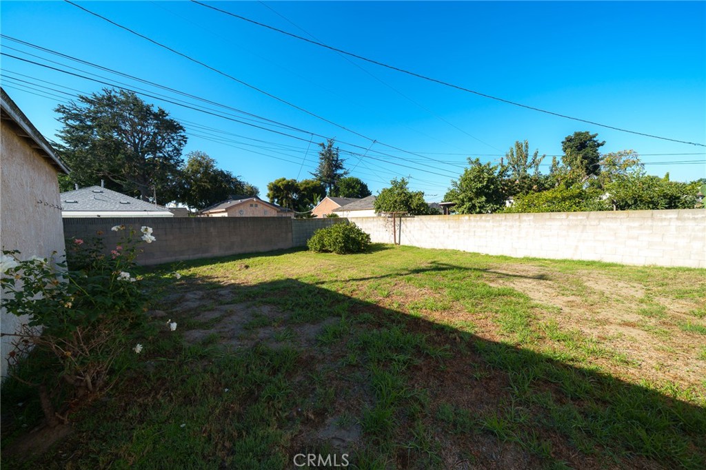 1908 East Orchard Street Compton, CA 90221 - Photo 3 of 6 SPACE IS IDEAL FOR A FAMILY LOOKING TO ENTERTAIN OR DEVELOP AN ADU