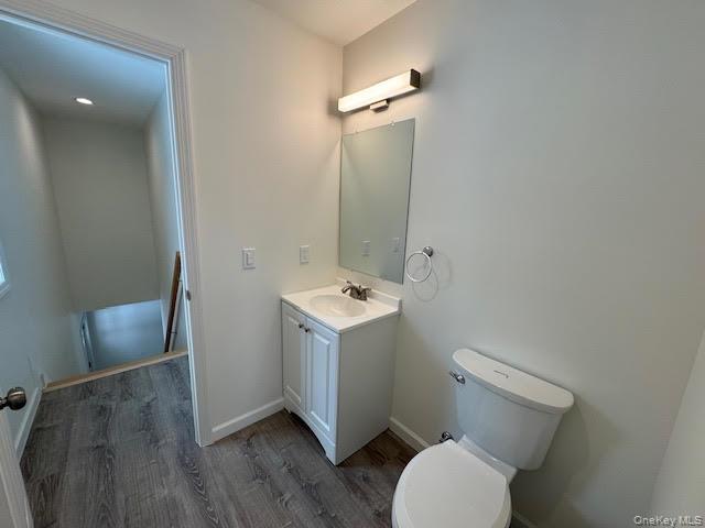 11 Alexandra Matthews Road, Unit B Wallkill, NY 12589 - Photo 18 of 41 a bathroom with a sink mirror vanity and toilet