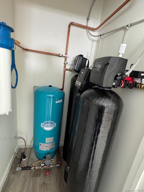 11 Alexandra Matthews Road, Unit B Wallkill, NY 12589 - Photo 31 of 41 a view of walk in closet with clothes and shoes