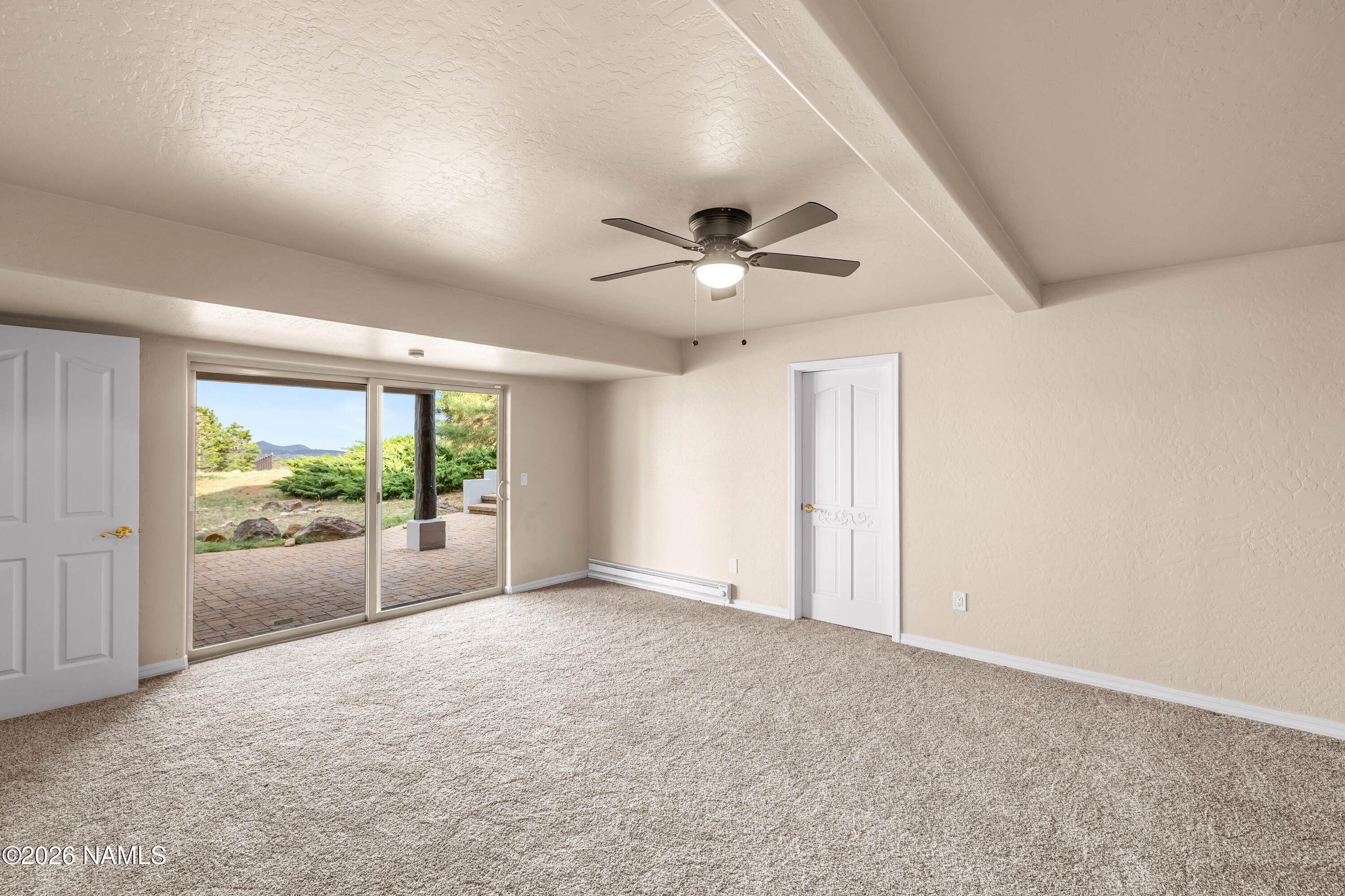 8205 North Reata Road Flagstaff, AZ 86004 - Photo 26 of 45 Living area with walk out basement