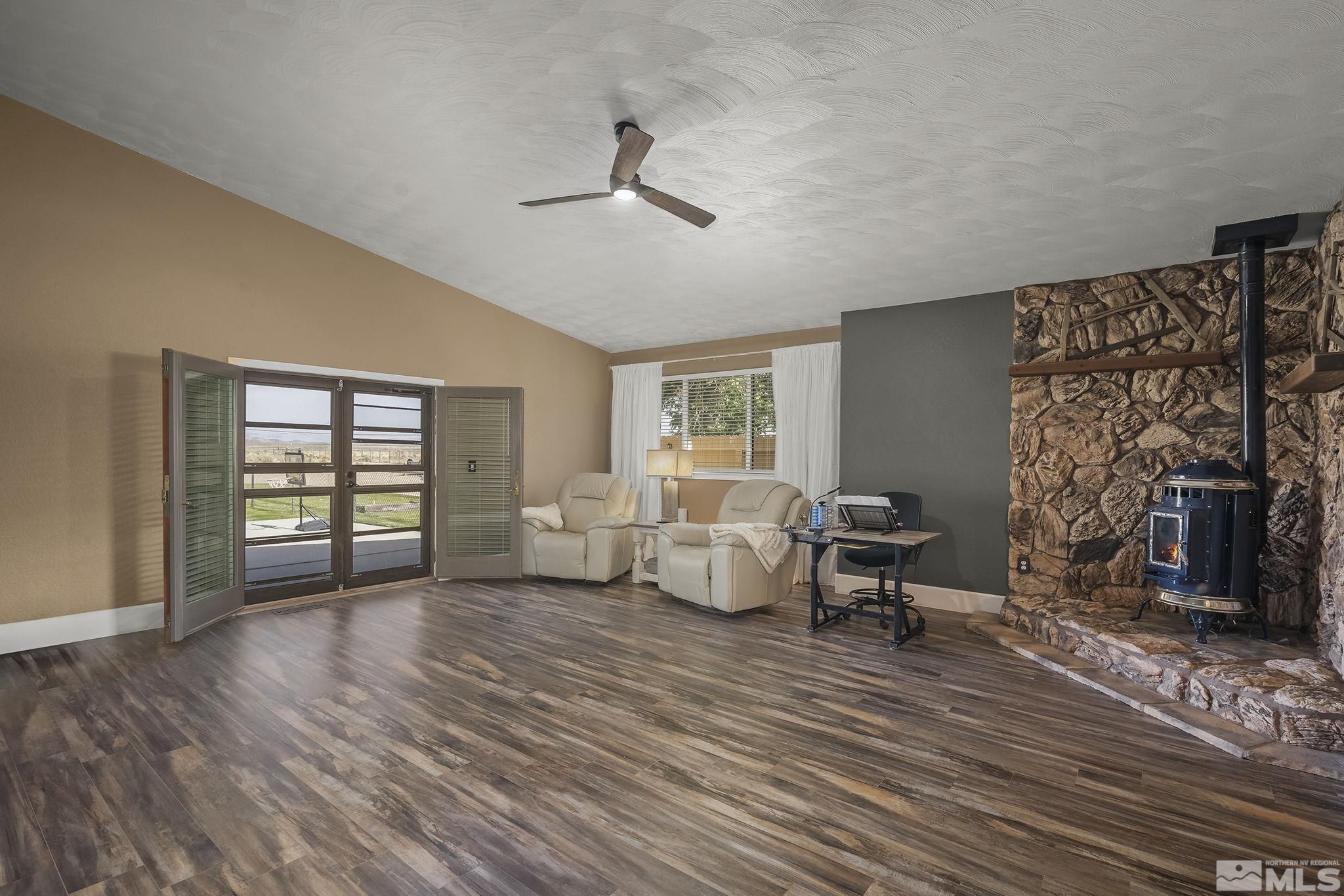 10890 Osage Road Reno, NV 89508 - Photo 12 of 40 a living room with furniture and a fireplace