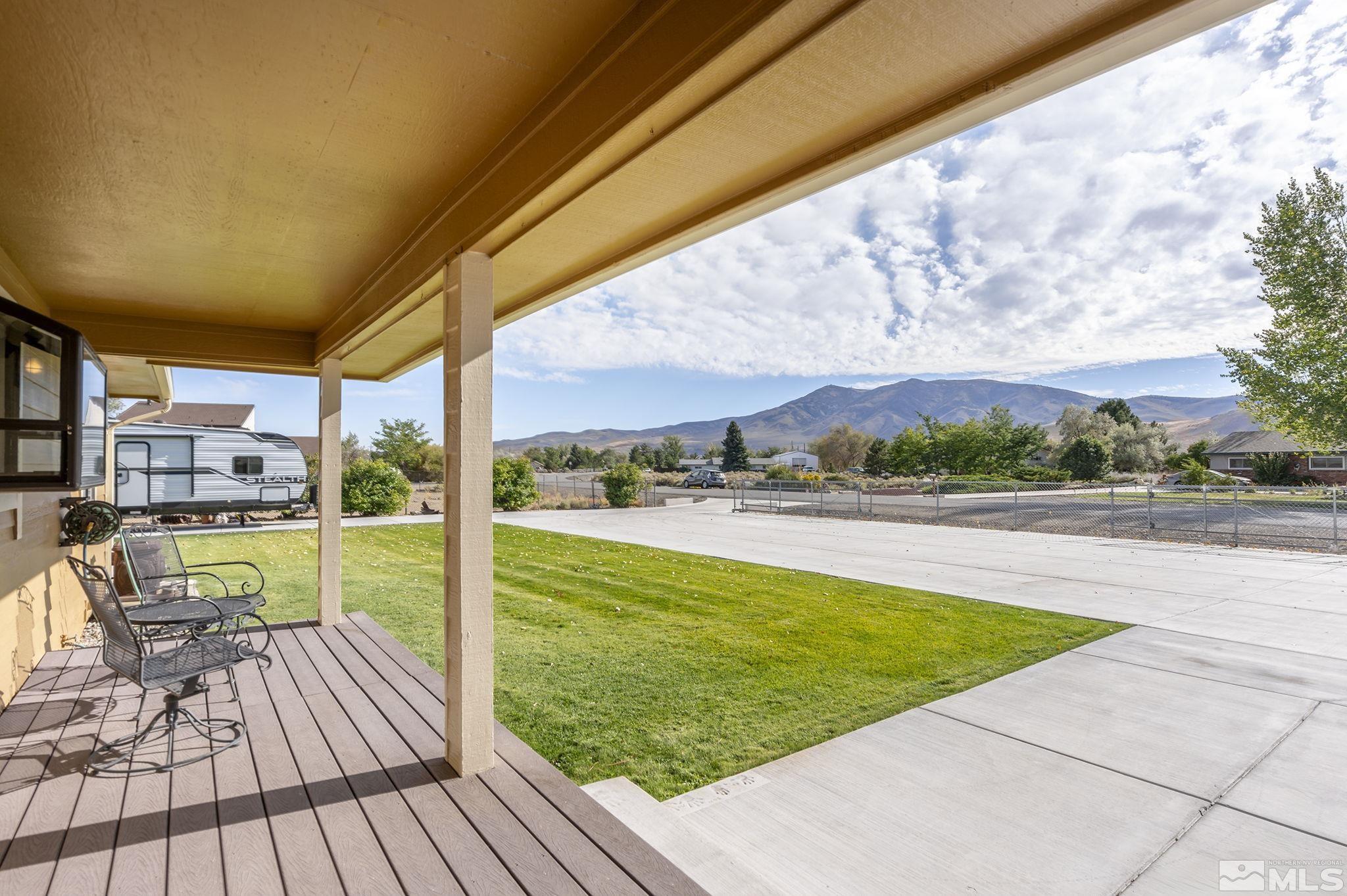 10890 Osage Road Reno, NV 89508 - Photo 3 of 40 a view of swimming pool from a balcony with seating space