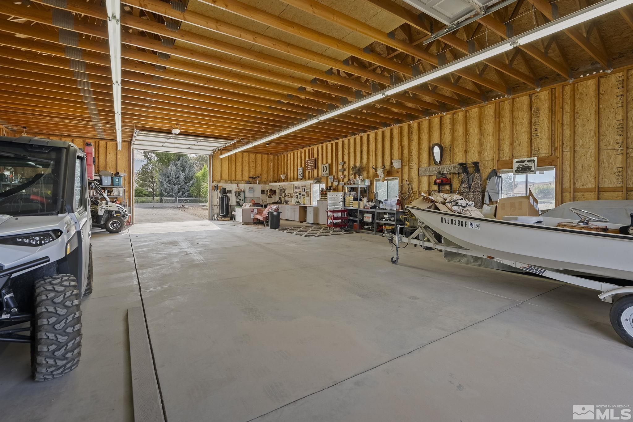 10890 Osage Road Reno, NV 89508 - Photo 32 of 40 a view of a garage with cars