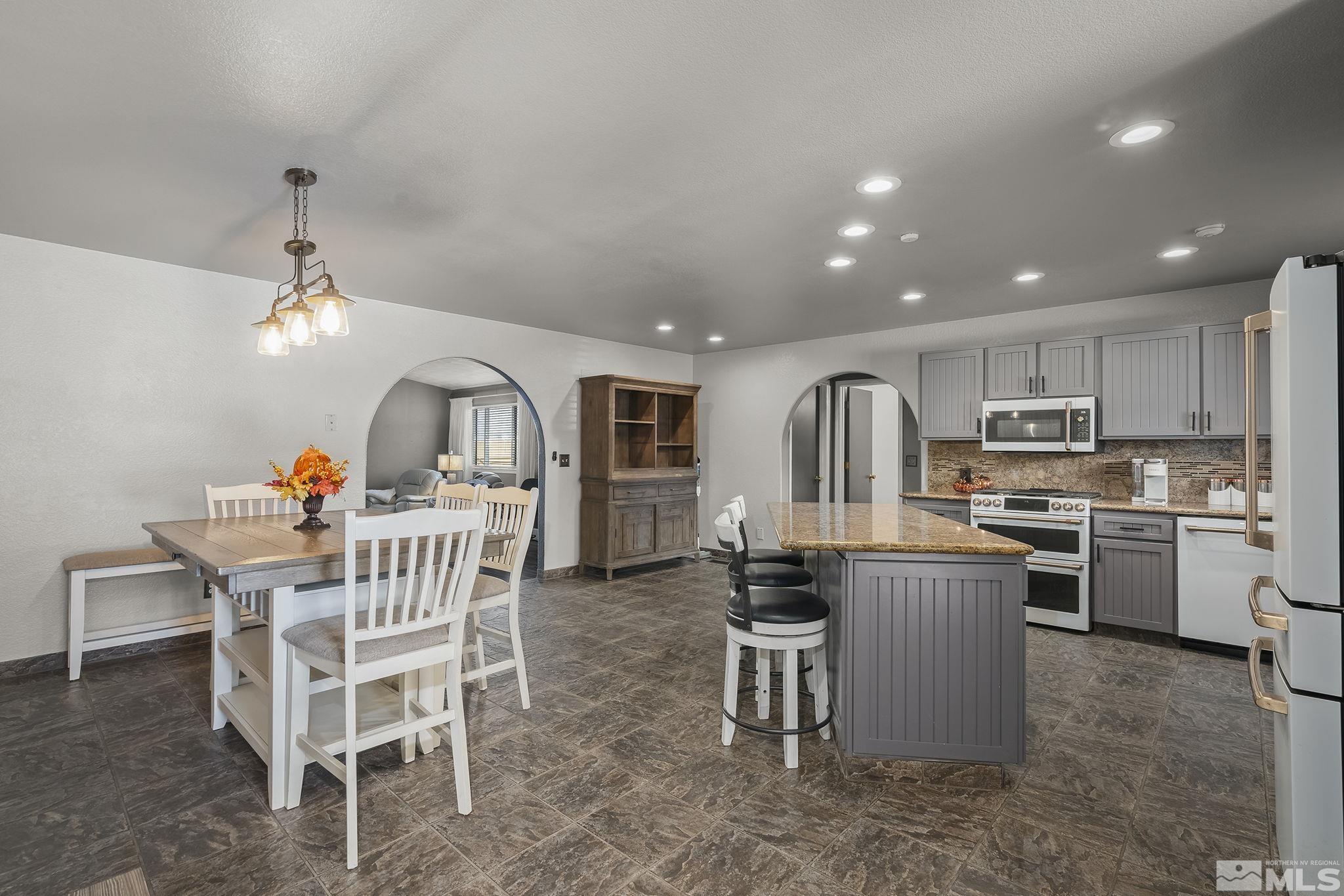 10890 Osage Road Reno, NV 89508 - Photo 5 of 40 a view of a dining room with furniture