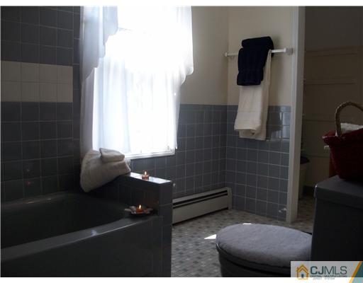 13 Yellowbrook Road Monmouth County, NJ 07728 - Photo 6 of 10 a bathroom with a sink