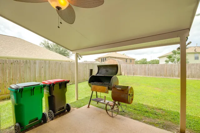 a view of a chairs in backyard