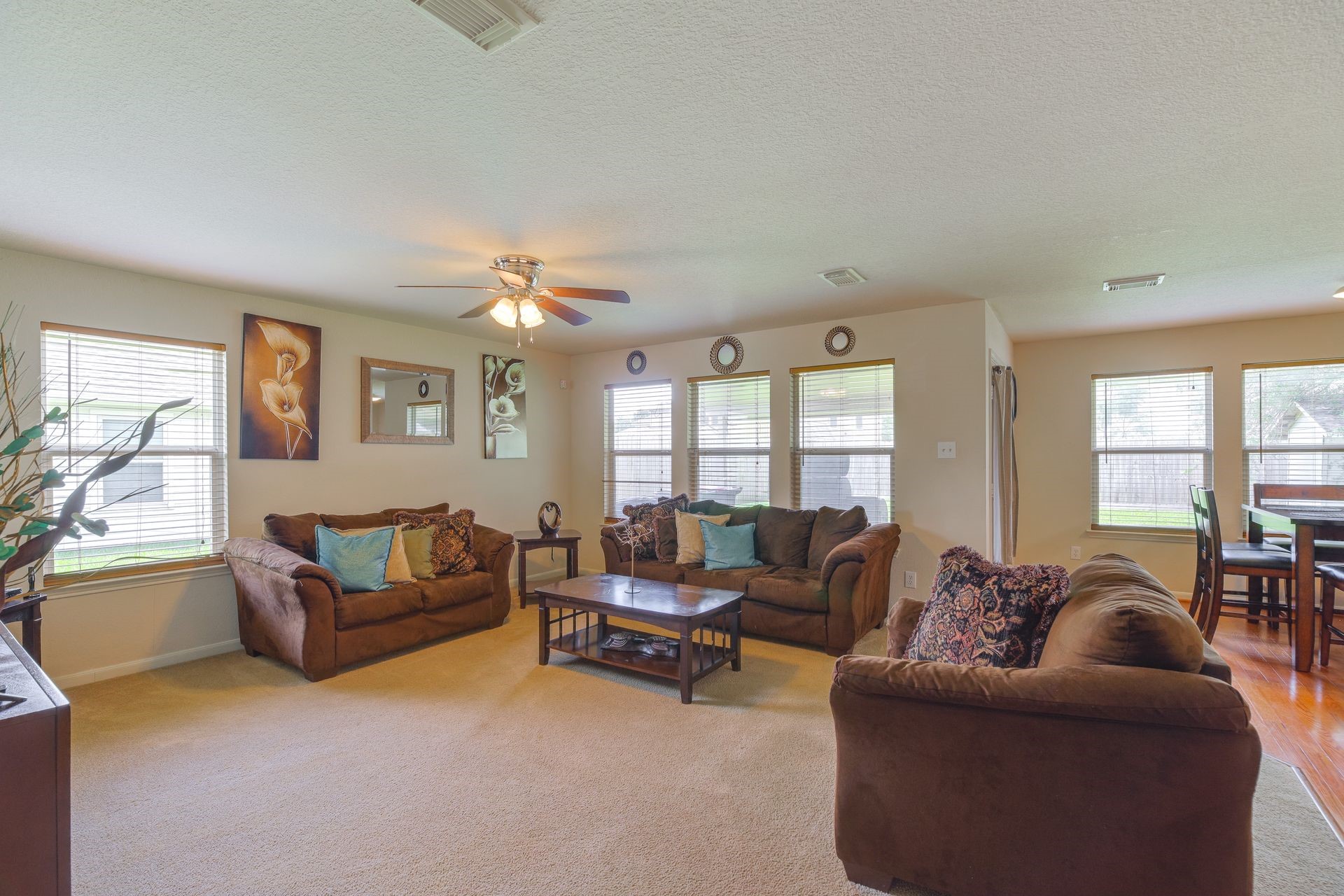 8019 Berkely Court Baytown, TX 77521 - Photo 5 of 13 a living room with furniture and a large window
