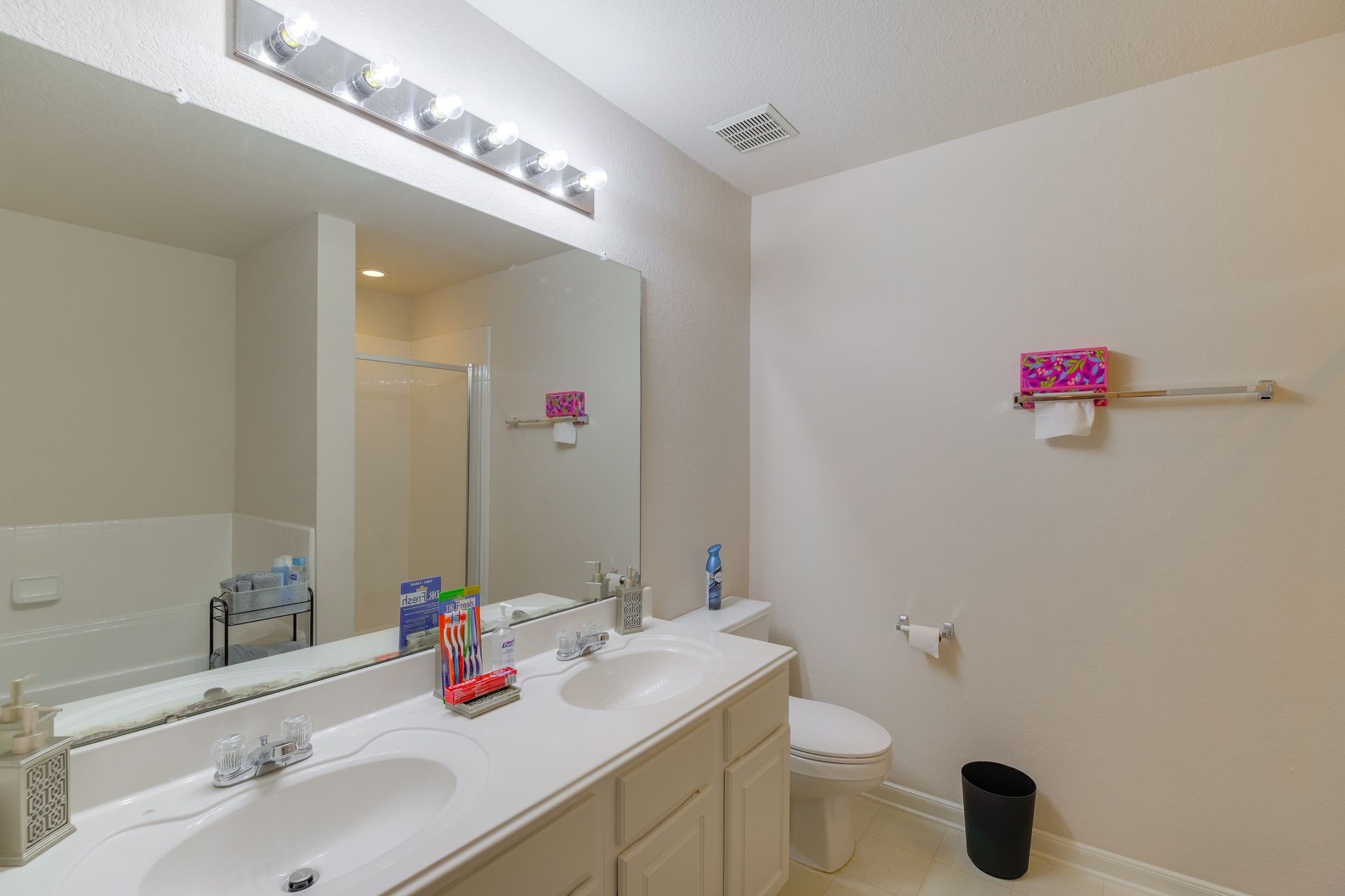 8019 Berkely Court Baytown, TX 77521 - Photo 9 of 13 a bathroom with a sink and a mirror