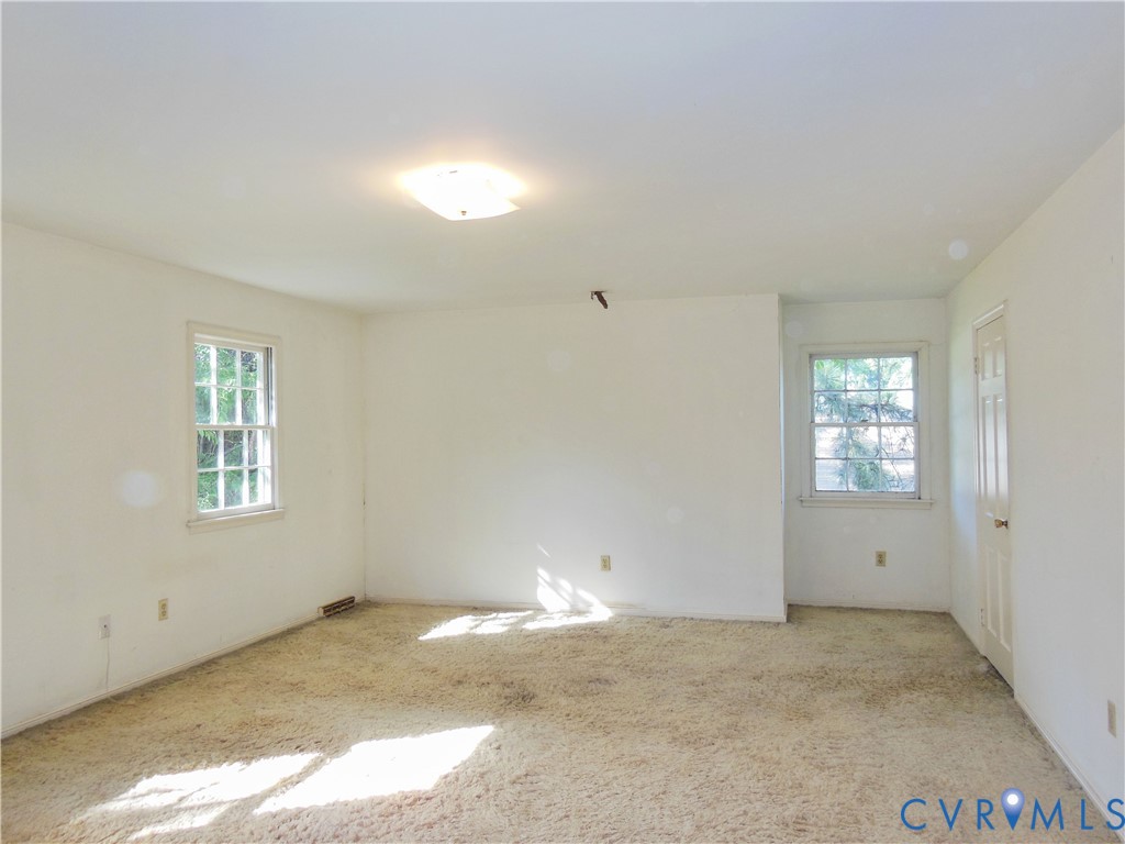 8218 Overbury Road Richmond, VA 23227 - Photo 25 of 37 a view of empty room with window
