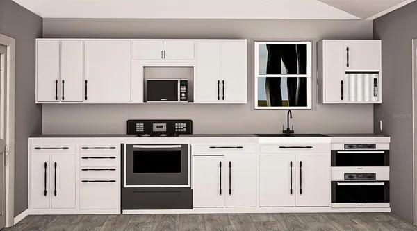 a kitchen with cabinets and appliances
