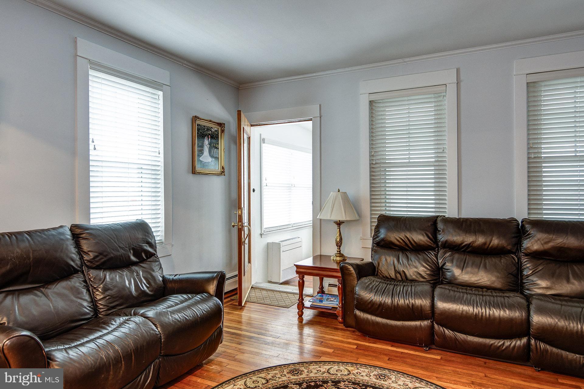 13 West Euclid Avenue Haddonfield, NJ 08033 - Photo 11 of 45 a living room with furniture and a window