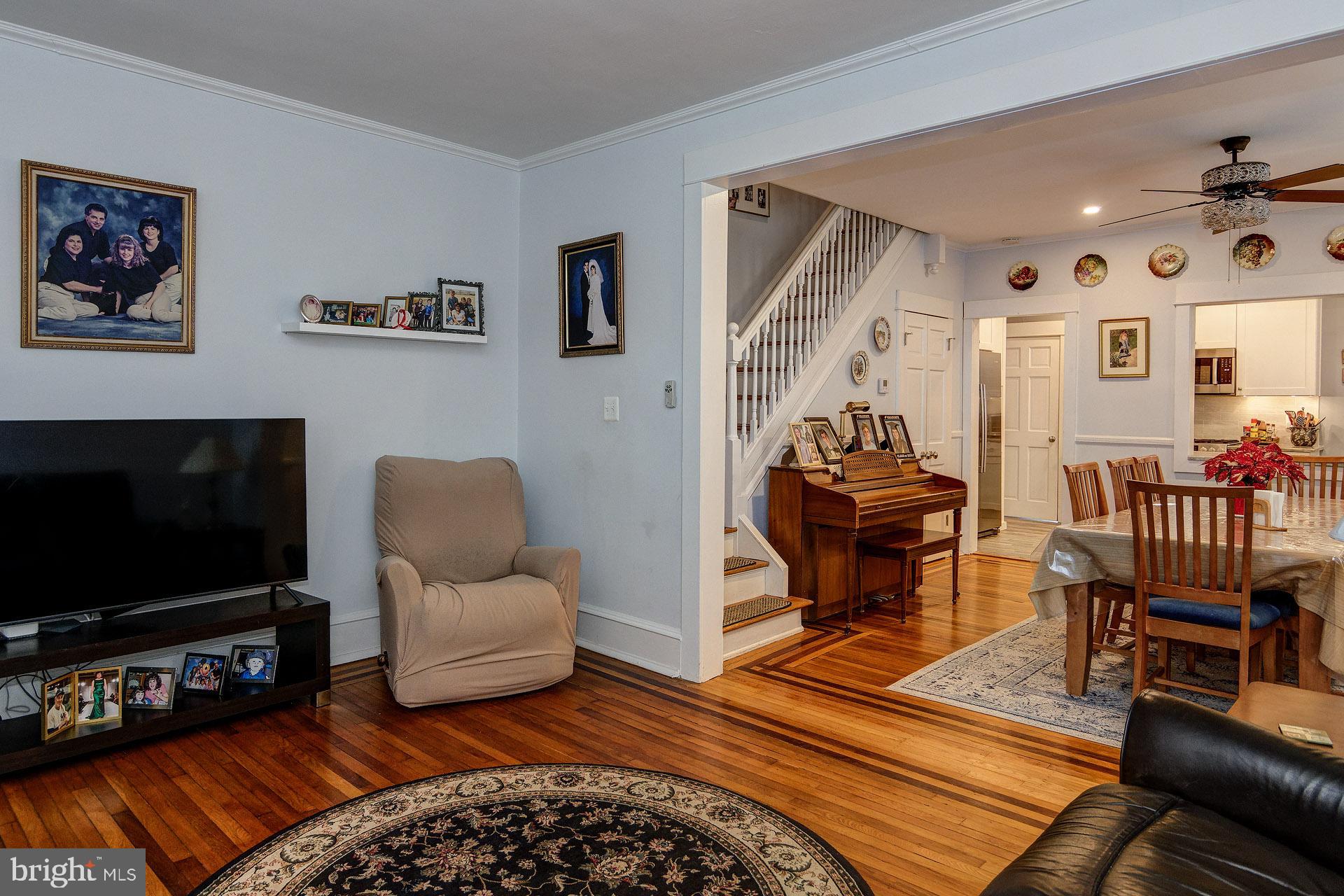 13 West Euclid Avenue Haddonfield, NJ 08033 - Photo 13 of 45 a living room with furniture and a flat screen tv
