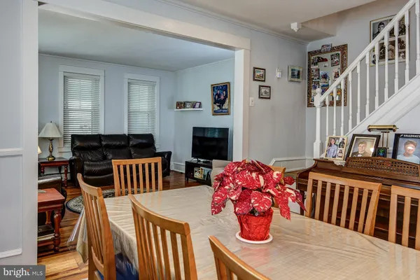 a bedroom with furniture and a fireplace