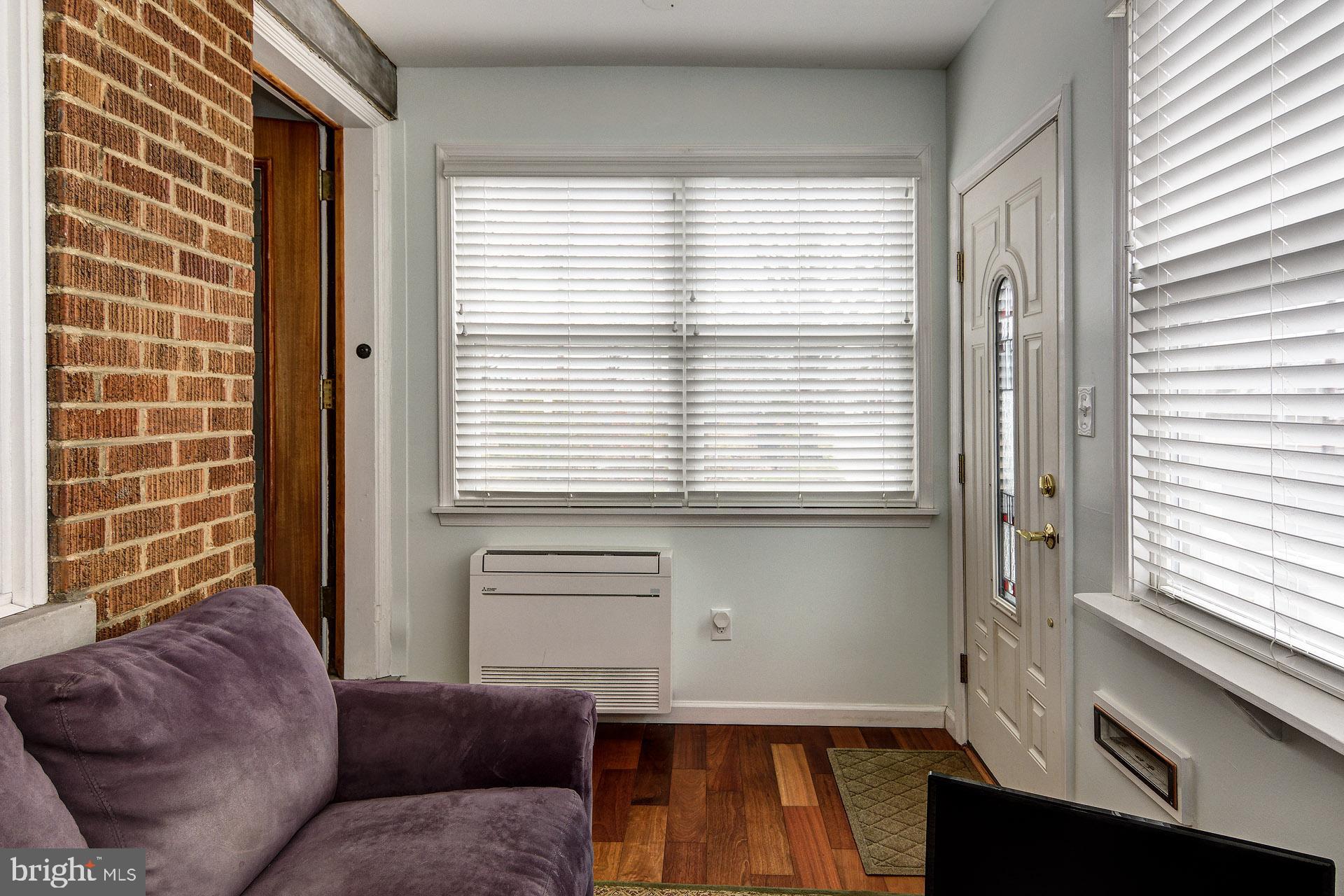 13 West Euclid Avenue Haddonfield, NJ 08033 - Photo 25 of 45 a living room with furniture and a window