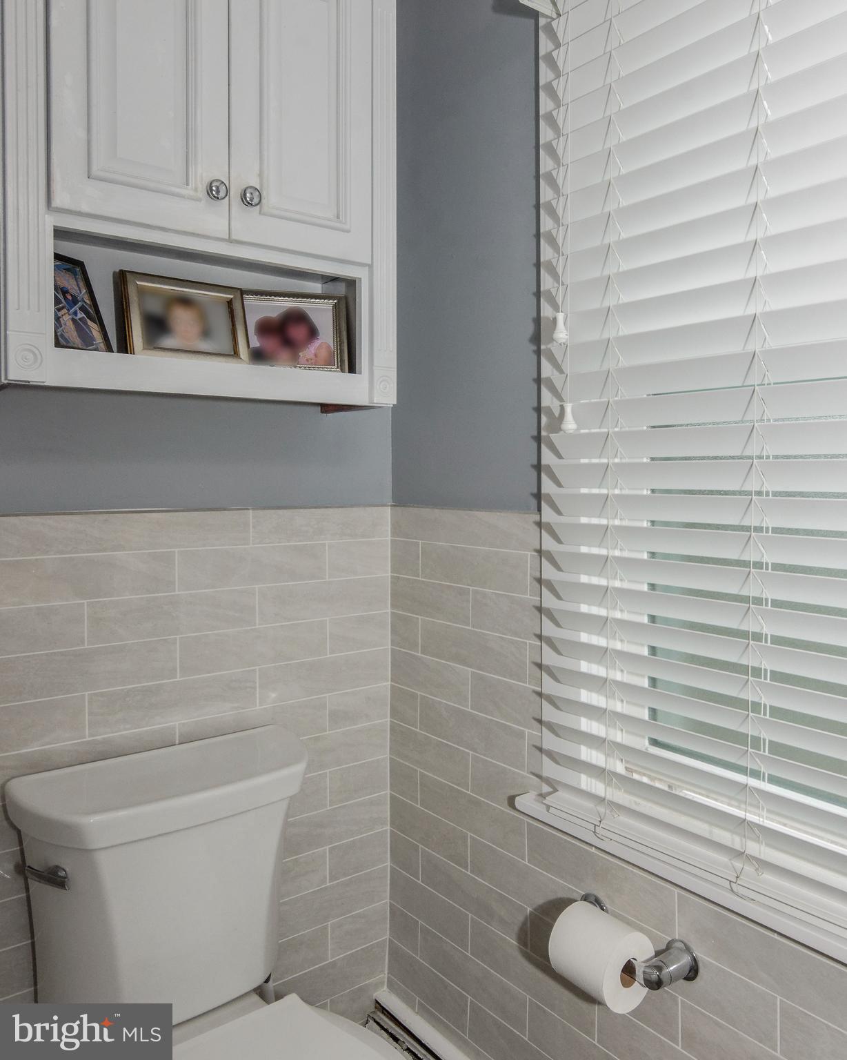 13 West Euclid Avenue Haddonfield, NJ 08033 - Photo 26 of 45 a bathroom with a toilet and a shower