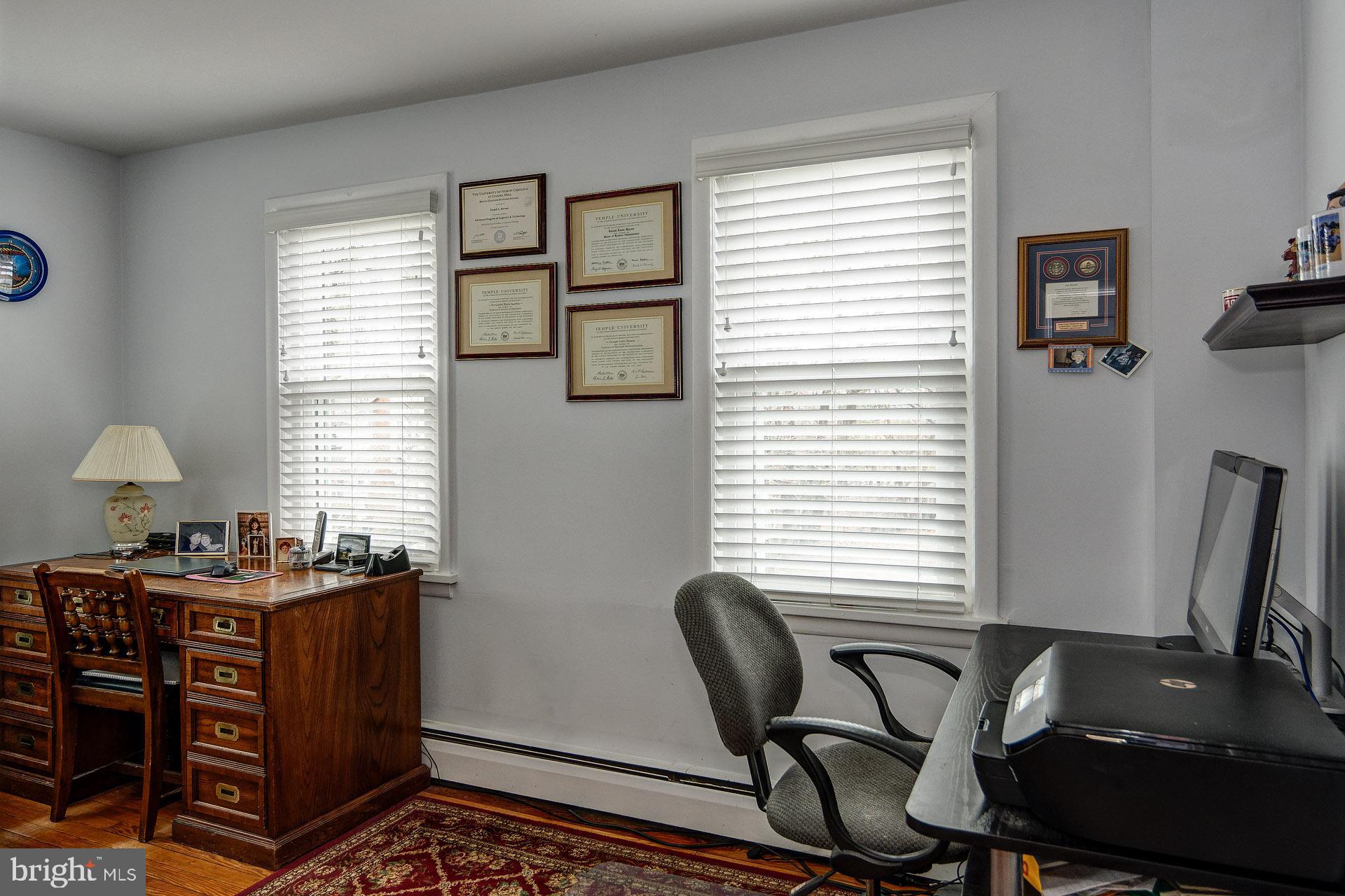13 West Euclid Avenue Haddonfield, NJ 08033 - Photo 37 of 45 a view of a workspace with furniture and a window