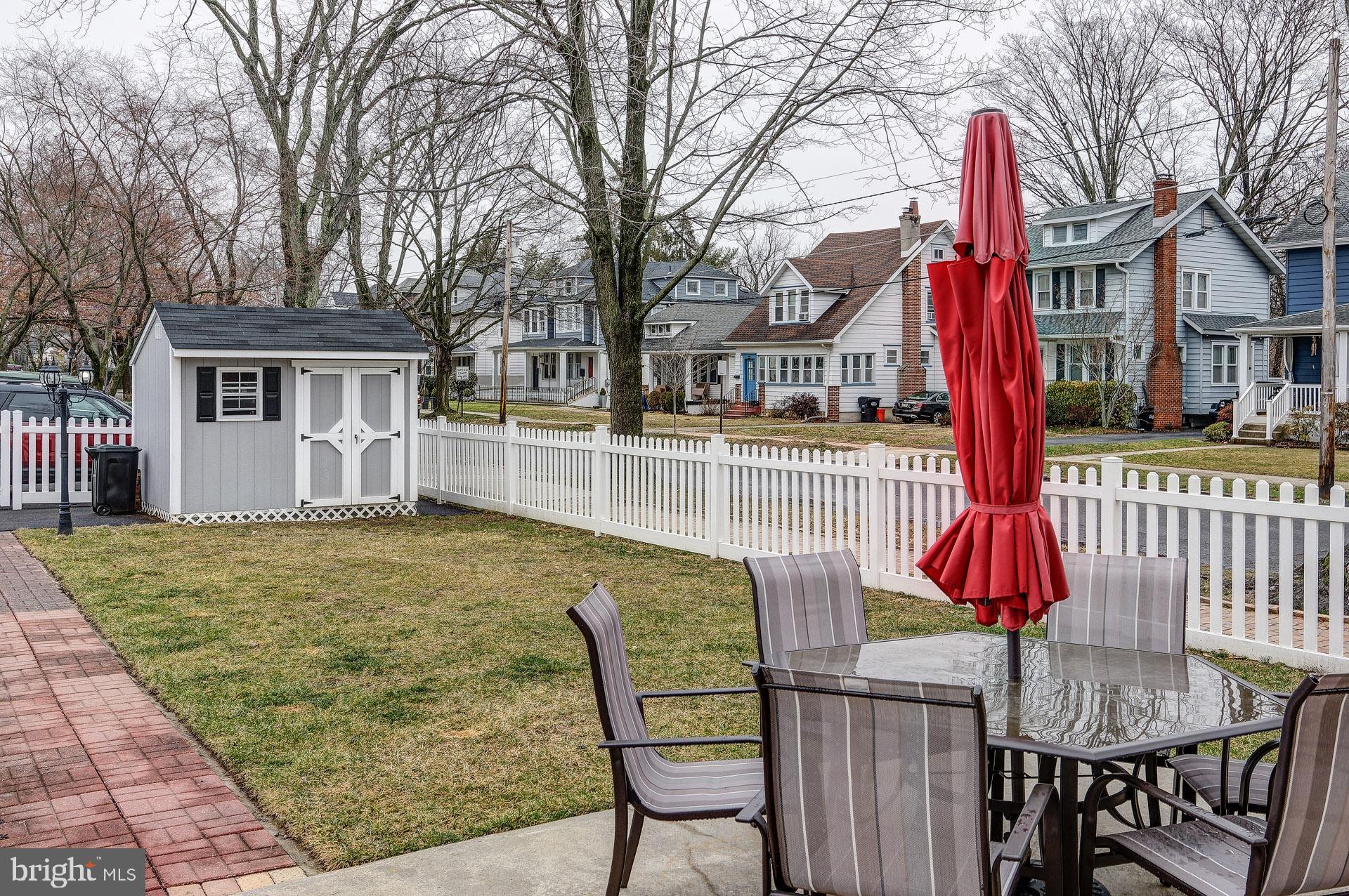 13 West Euclid Avenue Haddonfield, NJ 08033 - Photo 5 of 45 a front view of a house with garden