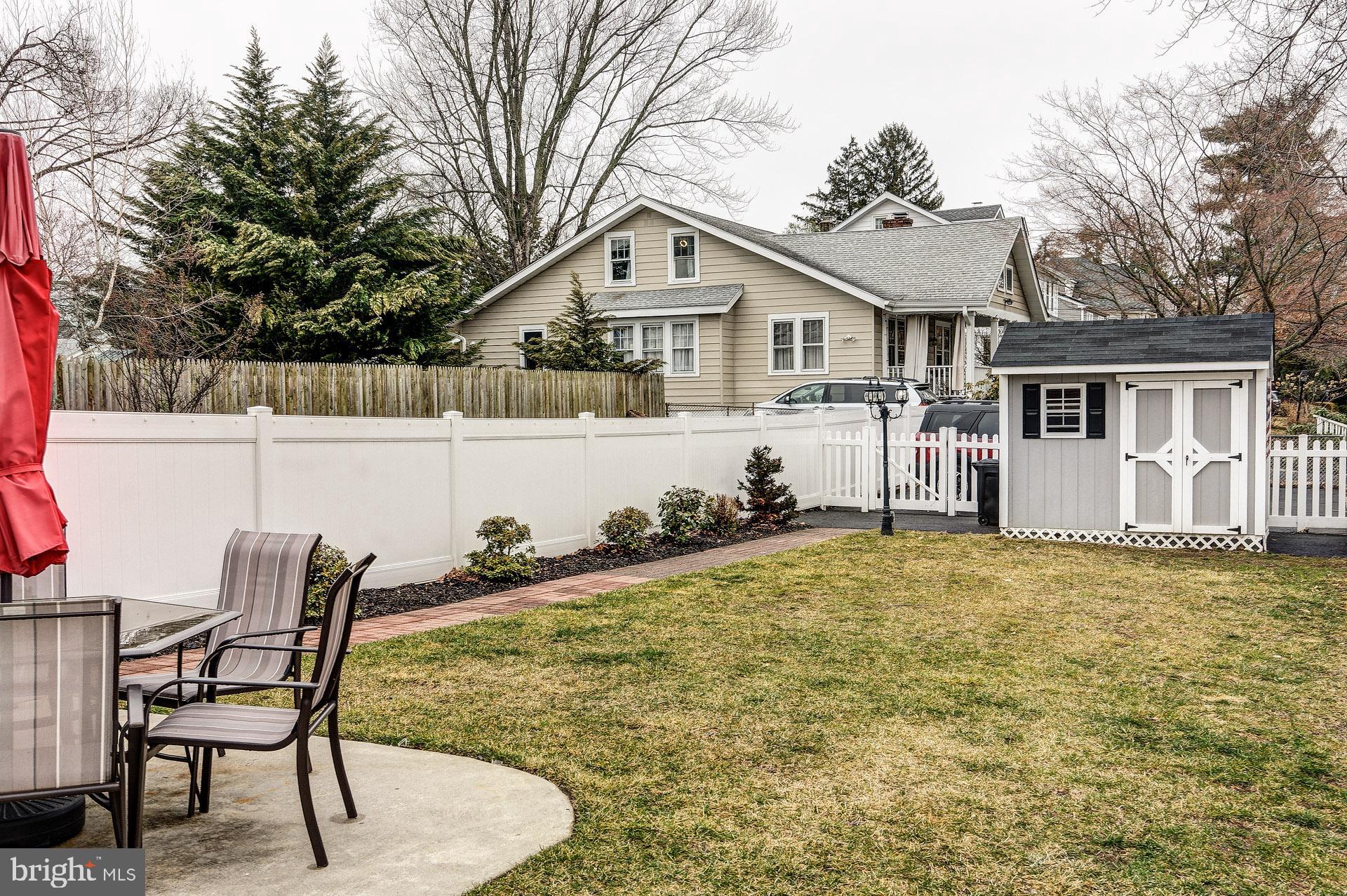13 West Euclid Avenue Haddonfield, NJ 08033 - Photo 6 of 45 a front view of house with yard and seating area