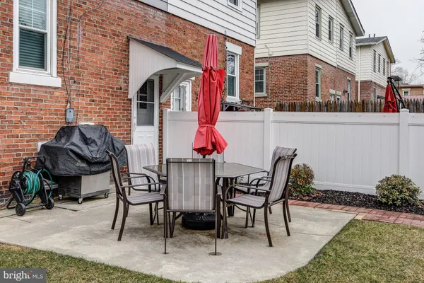 a view of two chairs in patio