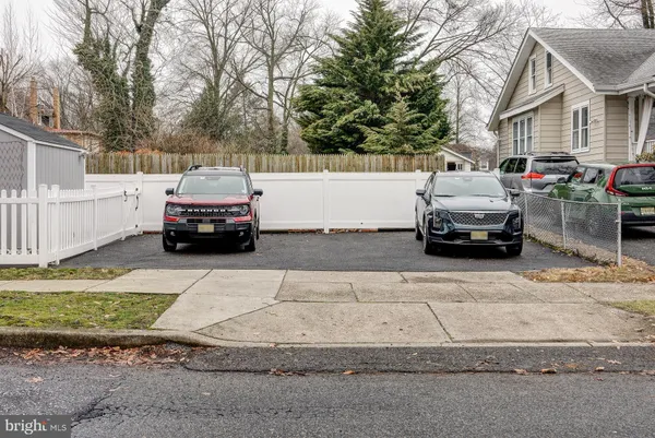a car parked in front of a house