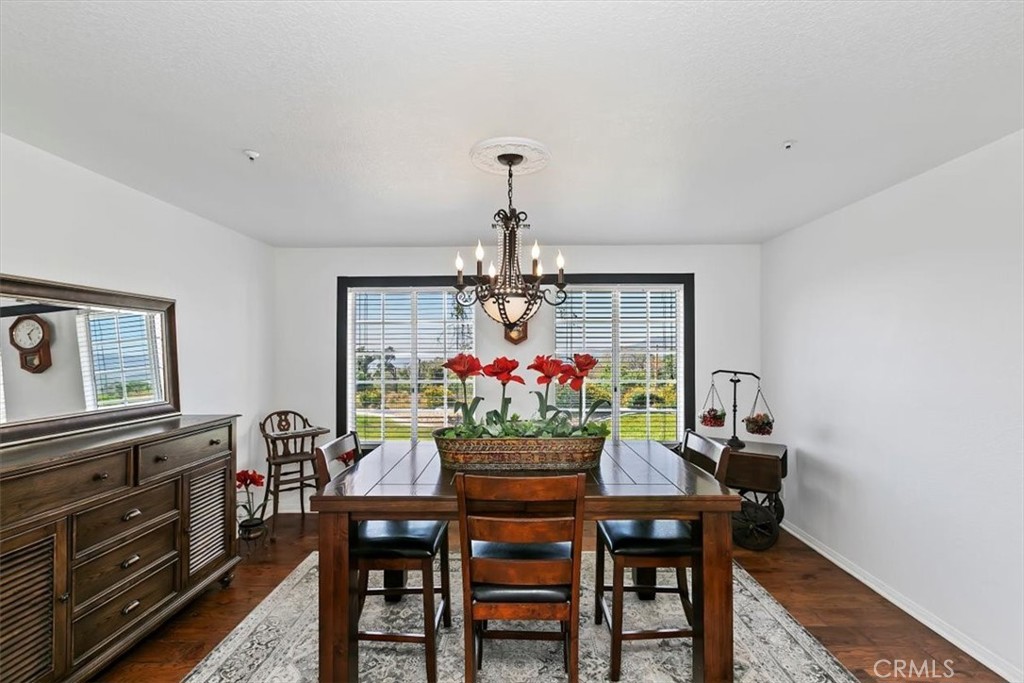 923 Devore Road San Bernardino, CA 92407 - Photo 29 of 75 a view of a dining room with furniture window and wooden floor