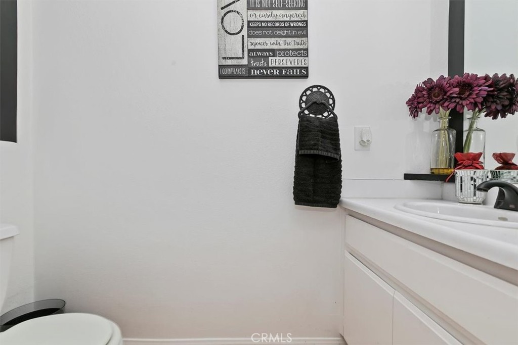 923 Devore Road San Bernardino, CA 92407 - Photo 30 of 75 a bathroom with a toilet and a shower