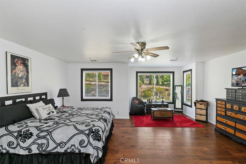 923 Devore Road San Bernardino, CA 92407 - Photo 35 of 75 a bed sitting in a bedroom next to a window