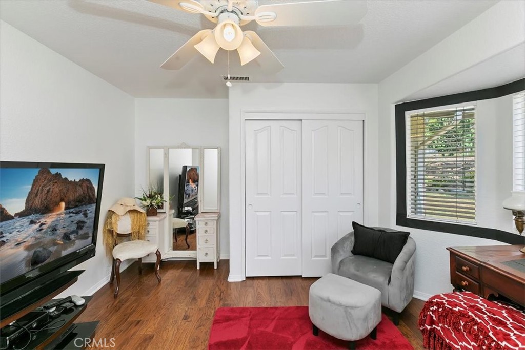 923 Devore Road San Bernardino, CA 92407 - Photo 41 of 75 a bedroom with furniture and a wooden floor