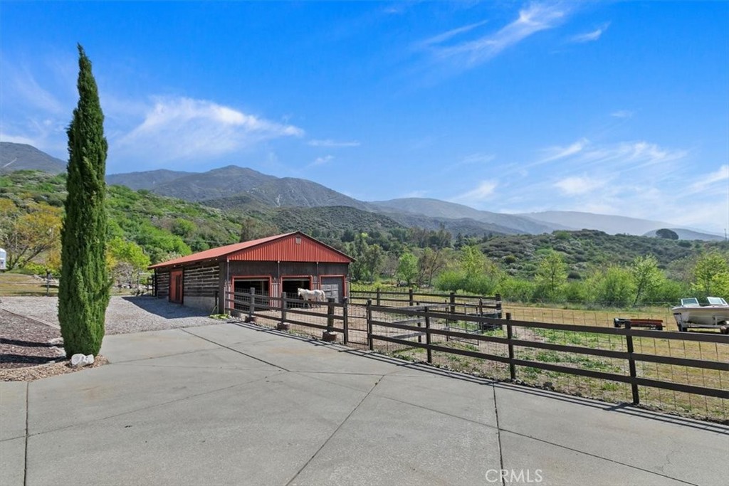923 Devore Road San Bernardino, CA 92407 - Photo 51 of 75 a view of a terrace with a garden