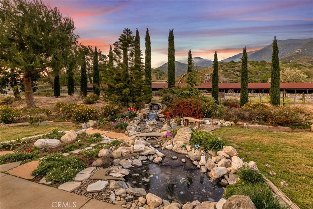 923 Devore Road San Bernardino, CA 92407 - Photo 71 of 75 a view of a garden with plants and large trees