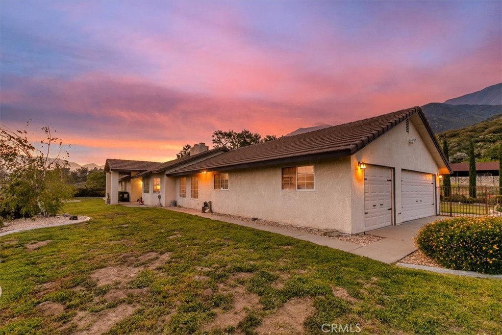 923 Devore Road San Bernardino, CA 92407 - Photo 73 of 75 a view of a house with a yard